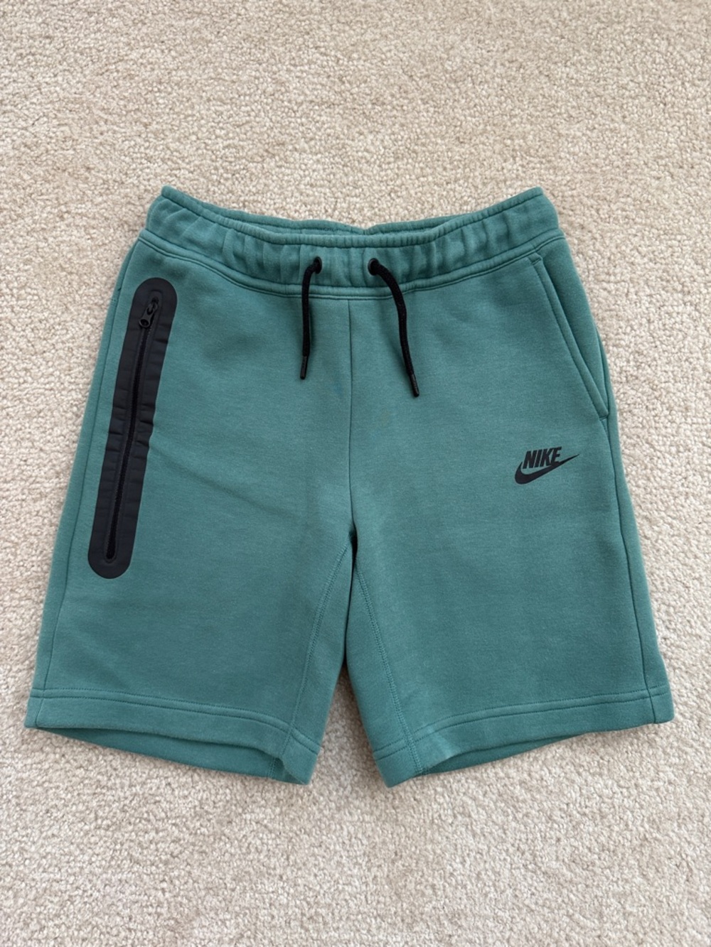 Nike Teal Green Kids Drawstring Shorts with Black Zip Accent